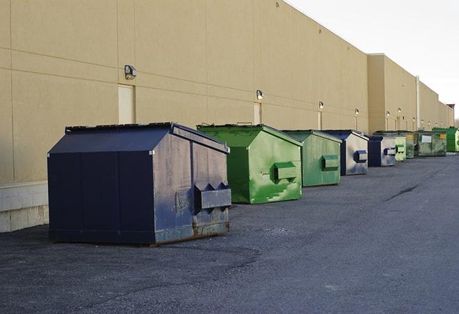 a view of a dumpster truck on a construction site in Cumming, GA